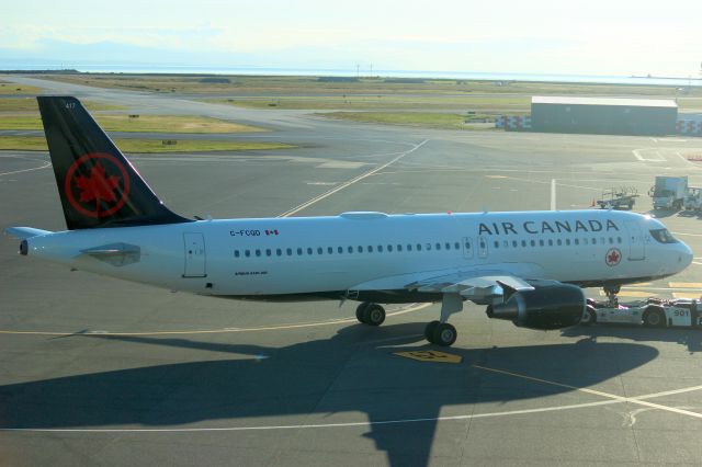 Airbus A320 (C-FCQD) - Pushing back from Gate C31 on 18-Jun-24.