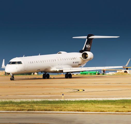 Canadair Regional Jet CRJ-900 (N956LR) - MESA CRJ-900ER turning off Runway 35Lat DFW after a flight from Phoenix!