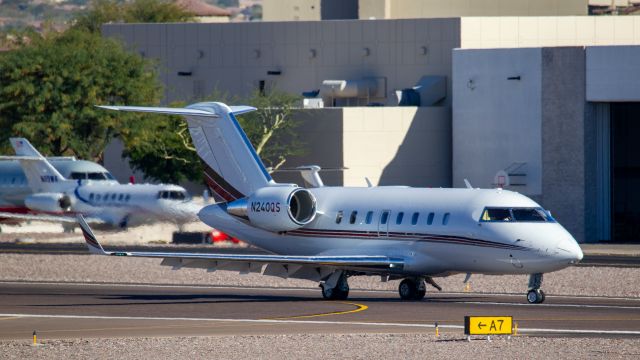 Canadair Challenger (N240QS) - Spotted at KSDL on December 26, 2020br /Spotting location: Airport business center br /br /Looking for a Realtor in the PHX area? Call Jake Youngs with Realty Executives at 602.628.3487 to find out how I can help you!