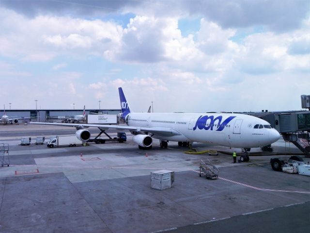 Airbus A340-300 (F-GLZN) - A340-313 now operated by Joon, loading for AF570 to Cairo