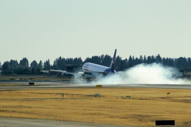 BOEING 767-300 (N124FE) - Touchdown!