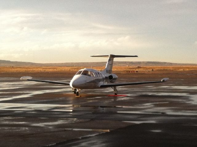 Eclipse 500 (N800JR) - Stopped to let the thunderstorm pass.  Ready to go again.