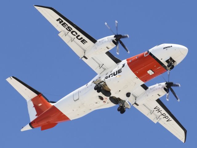 Fairchild Dornier 328 (VH-PPV) - Dornier 328-110 AMSA Rescue Aircraft approaches Townsville Airport after searching for 3 missing fisherman, who were all eventually found safe and sound.