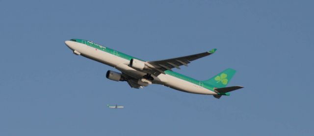 Airbus A330-300 (EI-DUB) - Aerlingus A330 climbing out while one circles before landing