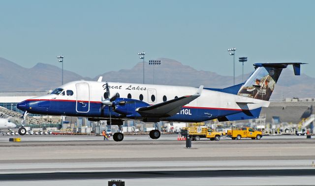 Beechcraft Beechjet (N211GL) - Great Lakes Airlines Raytheon 1996 Beech 1900D N211GL C/N UE-211 (McCarran International Airport)  Las Vegas - McCarran International (LAS / KLAS) USA - Nevada, January 25, 2011 Photo: Tomás Del Coro