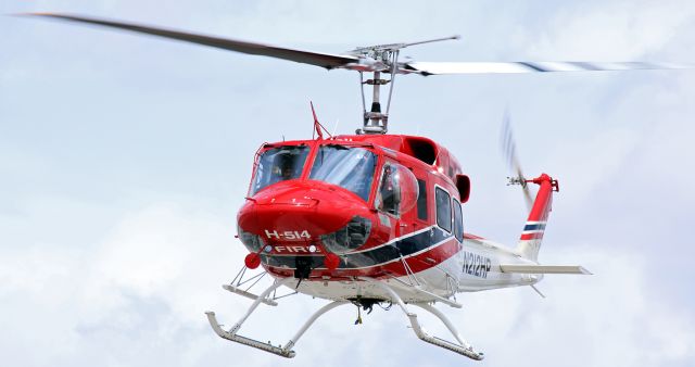 Bell VH-1 (N212HP) - CORPAT Inc's 1979 Bell 212 fire-fighting helicopter comes right at me as it departs Reno Stead Airport.