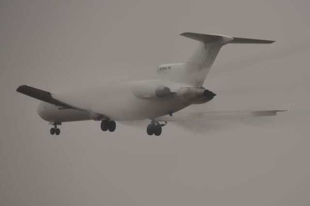 BOEING 727-200 (N215WE) - 23-R 01-23-24. Third to last 727 built. Even in the murkiness she still looks sexy.