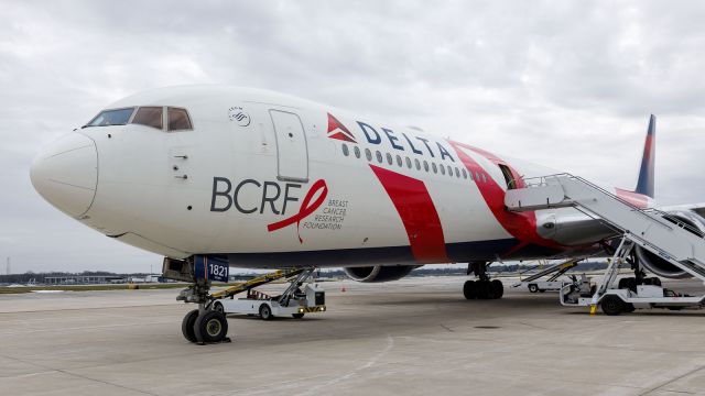 BOEING 767-400 (N845MH) - A Delta 767-400 sits on the ramp at Corporate Wings wearing the Breast Cancer Research Foundation Livery.
