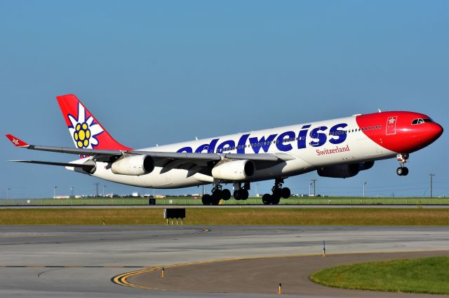 Airbus A340-300 (HB-JME) - Edelweiss Air Airbus A340-313 arriving at YYC on July 21.