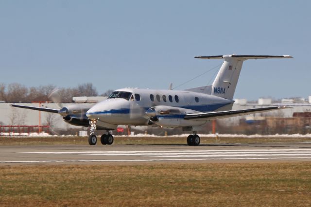 Beechcraft Super King Air 200 (N8NA) - NASA-8 beginning its' departure roll on RWY 24L on 1 Apr 2019.