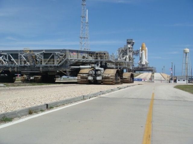 Boeing 737-500 (ELL105) - Space Shuttle Endeavour on the launch pad with the crawler in front.  Taken April 2009.