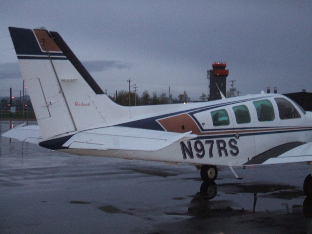 Beechcraft Baron (58) (N97RS) - Parked at Woodward Aviation FBO, Goose Airport NL. June11/09