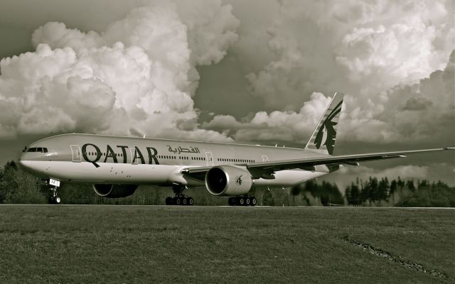 Boeing 777-200 (A7-BAZ) - Qatar Airways Boeing 777-3DZER  LN 1093 CN 41781br /Reprocessed from an earlier shot. Thought the br /clouds were pretty spectacular. 4.15.13