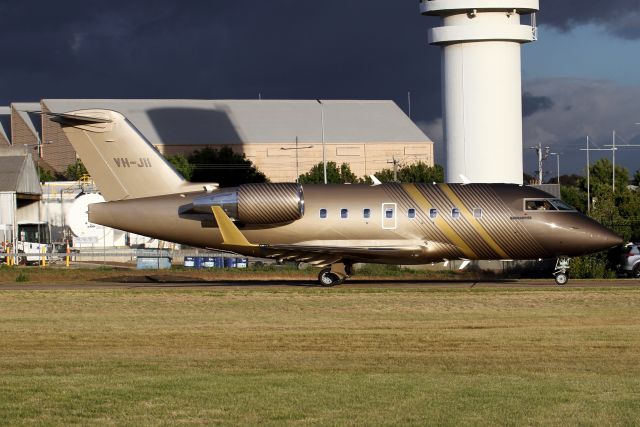 Canadair Challenger (VH-JII) - Taxiing to its parking spot after arriving from Nadi completing its delivery flight.