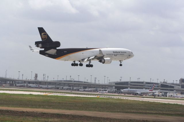 Boeing MD-11 (N252UP) - UPS 2917 landing at KDFW after a flight from KONT