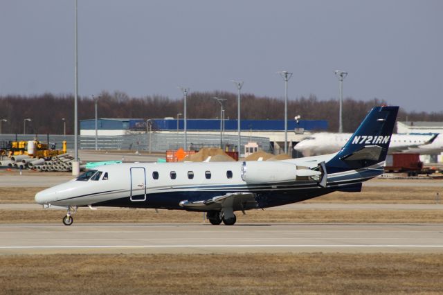 Cessna Citation Excel/XLS (N721RN) - Citation doing a couple of touch and goes at Grand Rapids International Airport runway 26L