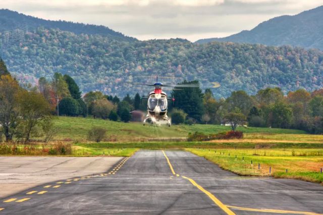 Eurocopter EC-635 (N558MT) - Taxiway A looking east