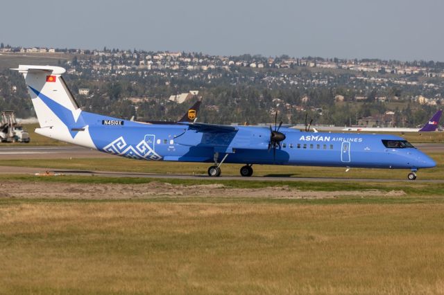 N451QX — - Asman Airlines first Q400 taxiing out on delivery to YFB.