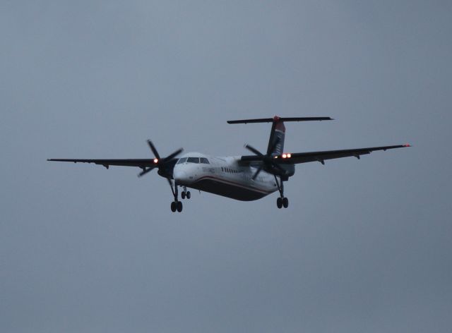 de Havilland Dash 8-300 (N336EN) - On final for runway 18L - 10/23/09