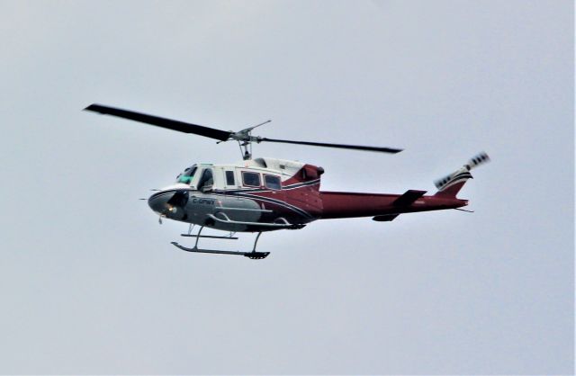 C-GPWX — - C-GPWX BELL 212-450 Pacific Western Helicopters Inc. survolant la ville de Lavaltrie QC. le 18-07-2022 12:36