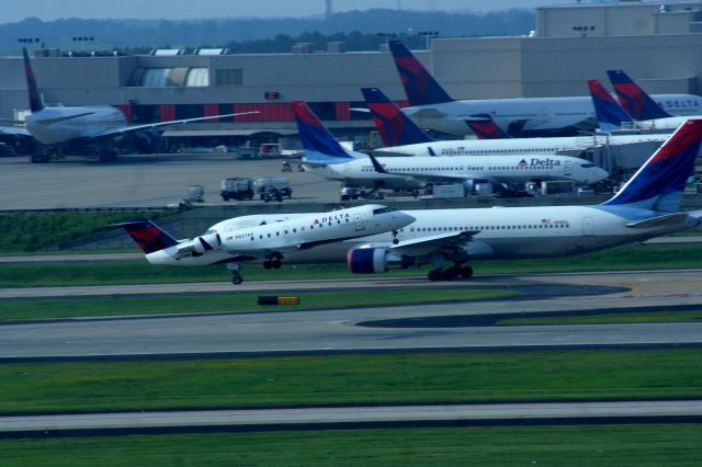 — — - I would say DELTA domination here at Atlanta Hartsfield,, with a  little mini me up front.. headed to mississippi