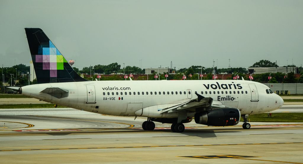 Airbus A319 (XA-VOE) - XA-VOE Volaris Airbus A319-133 (cn 3069) "Emilio" - Chicago Midway International Airport (IATA: MDW, ICAO: KMDW, FAA LID: MDWbr /Photo: TDelCorobr /July 12, 2018