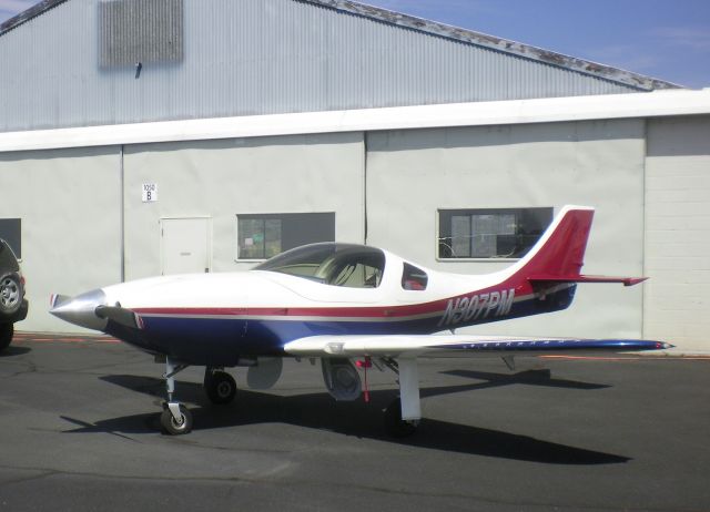 Lancair Legacy 2000 (N307PM) - N307PM is a 2004 Lancair Legacy with IO-550 engine and two-blade propeller. The Legacy was displayed at the 30th Annual Lancair Fly-In.