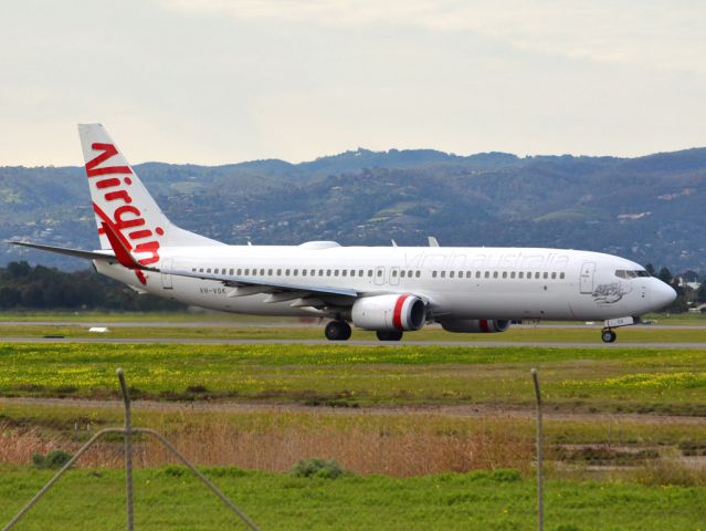 Boeing 737-700 (VH-VOK) - On taxi-way heading for take off on runway 05. Thursday 12th July 2012.