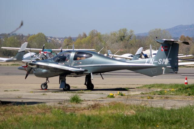 Diamond Twin Star (LN-SMF) - Parked on the ramp on 11-Apr-25 prior to departure for LSZH.