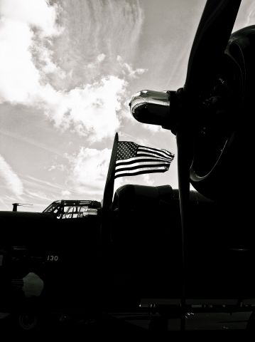 Consolidated B-24 Liberator (25-2534) - B-24 "Witchcraft" flies Old Glory at static display, Winter Haven, FL