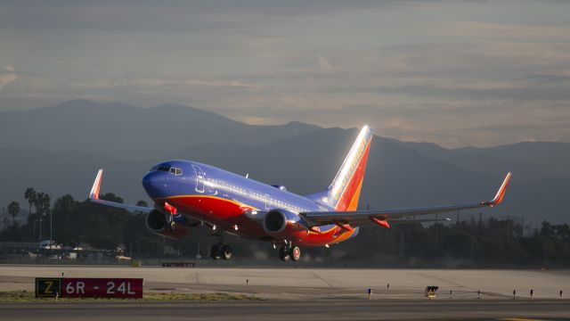 Boeing 737-700 (N499WN) - Early morning departure from LAX, Los Angeles International Airport, California USA. 19 Nov 2014