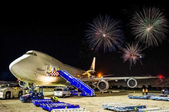 BOEING 747-8 (N859GT) - New Years In Chile | Chilebr /br /The rampers watch as New Years gets rung in with a bang. Atlas Airs newest addition sits on the ramp awaiting the rampers to finish before blasting off for Miami. br /br /©Bo Ryan Photography | a rel=nofollow href=http://www.facebook.com/boryanphotowww.facebook.com/boryanphoto/a