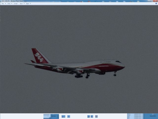 Boeing 747-400 (N744ST) - on approach to KCOS, in rain -  17.07.31