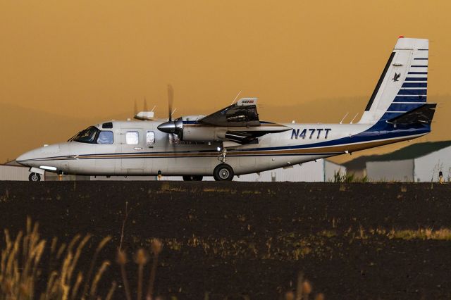 Gulfstream Aerospace Jetprop Commander (N47TT) - Rockwell 695 Jetprop Commander sits at the end of runway 8 at the Idaho County Airport in Grangeville, awaiting the passing of a significant thunderstorm as smoke inundates the area.