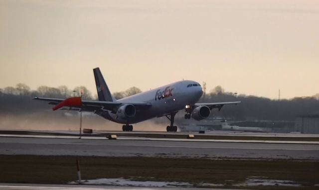 Airbus A300F4-600 — - One of my first ever pictures of a FedEx aircraft. Rotating off of runway 10, pretty rare for a plane to use this runway at all. Hence the beautiful view!