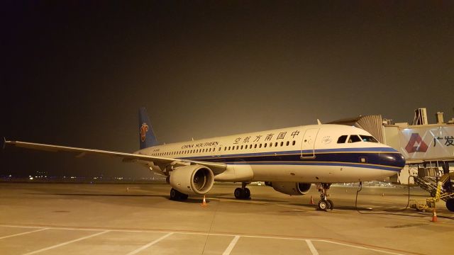 Airbus A320 (B-2406) - Early morning at the gate at Guangzhou Baiyun International Airport (ZGGG) in Guangzhou, China.