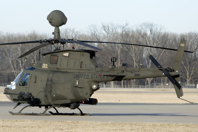 Bell JetRanger (9500083) - OH-58D Kiowa Warrior, of the 1-230th Air Cav, of the Tennessee NG, arrived on a pit stop. On their way to Ft. Hood, Texas, for pre-deployment training. The rear view of the Kiowa Warrior with some detail. On the right side they carry the M260 7-shot 2.75-inch rocket pod, and on the left the M3P .50 caliber machine gun. -February 2014
