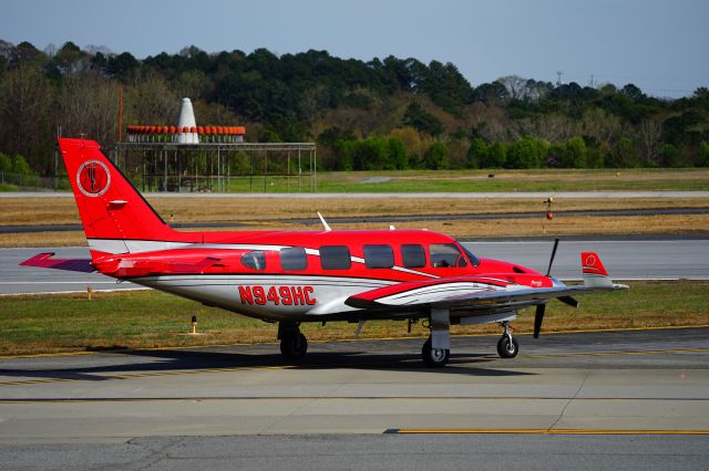 Piper Navajo (N949HC) - Elevated observation platform at Dekalb Peachtree Airport. 