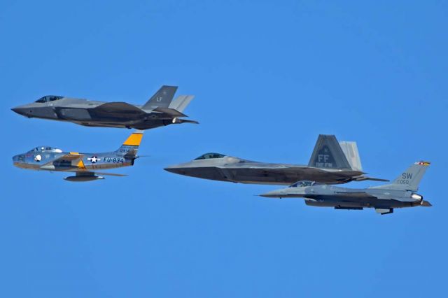 Lockheed F-35C (14-5095) - North American F-86F Sabre NX186AM, Lockheed-Martin F-35A Lightning II 14-5095, Lockheed-Martin F-22A Raptor, and Lockheed-Martin F-16CJ Block 50 Fighting Falcon 01-7050 participating in the Air Force Heritage Conference at Davis-Monthan AFB on March 4, 2018.