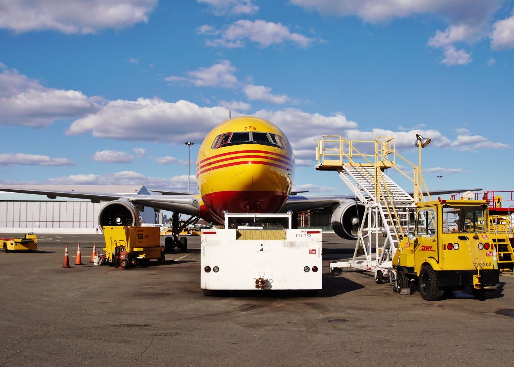 BOEING 767-200 (N773AX) - All the DHL equipment staged and ready to load out N773AX on FlightAware.Com B767-200F