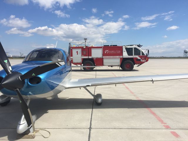 Cirrus SR-22 (C-GOZO) - Fire Truck driving by