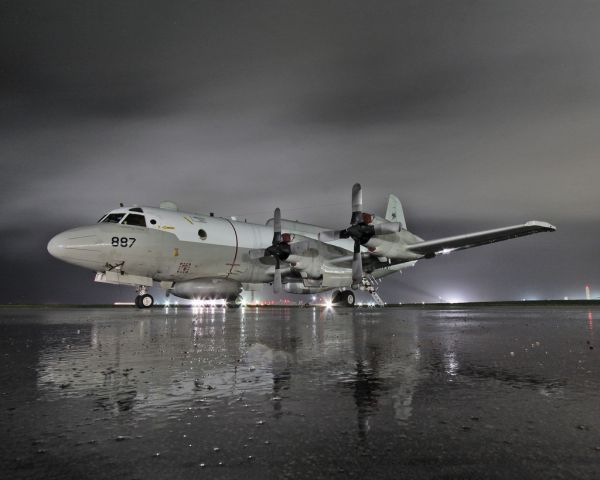 Lockheed P-3 Orion (15-9887) - EP-3 night shot in the south Pacific, this is the follow-on shot to my previous photo.  Clouds had moved in.  30 second exposure.  Canon 10-22mm.  Looks sharper on Flickr.  Photo was approved via Navy channels, full photo credit:  LT Scott Shea, USN (me).  For ATC identification purposes, this is a P3, hence why it pops up as such.