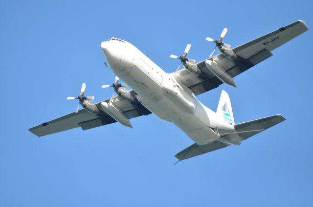 Lockheed C-130 Hercules (EI-JIV) - Air Contractors Lockheed Hercules Oil Spill Response flying low over Dublin City at Flight Fest 15.09.13. Only civil registered Hercules in Europe.