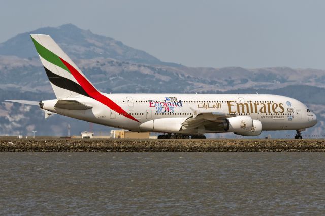 Airbus A380-800 (A6-EET) - 11th July, 2015.  View from a mile away ... SFO is one of the most difficult places to spot because the runways are almost a mile away from the nearest unrestricted vista point.  And then theres all the heat haze to contend with ... the micro-climate of San Francisco, nestled between the Pacific Ocean and the Bay makes for very interesting temperature gradients.