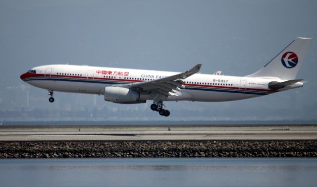 Airbus A330-200 (B-5937) - Landing 28L, arrival CE # 589 from Shanghai (PVG)  08-23-2015