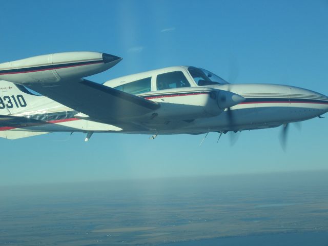 Cessna 310 (N68310) - Flying near Watertown South Dakota