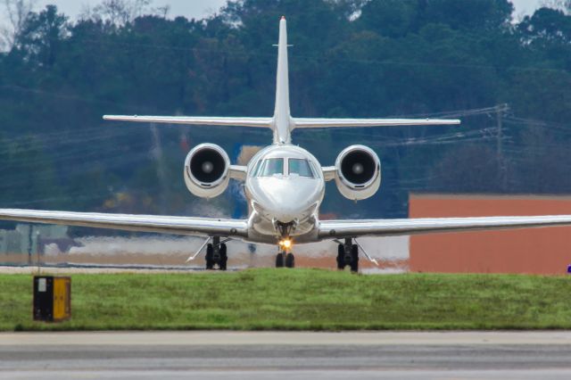 Cessna Citation Sovereign (N388QS) - This is a photo of N388QS a 2006 Cessna 680 that was taxiing to the ramp at Atlanta's PDK executive airport. I shot this with my Canon 800mm lens. The camera settings were 1/200 shutter, F11 ISO 160. I really appreciate POSITIVE VOTES & POSITIVE COMMENTS. Please check out my other aircraft photography. Questions about this photo can be sent to Info@FlewShots.com