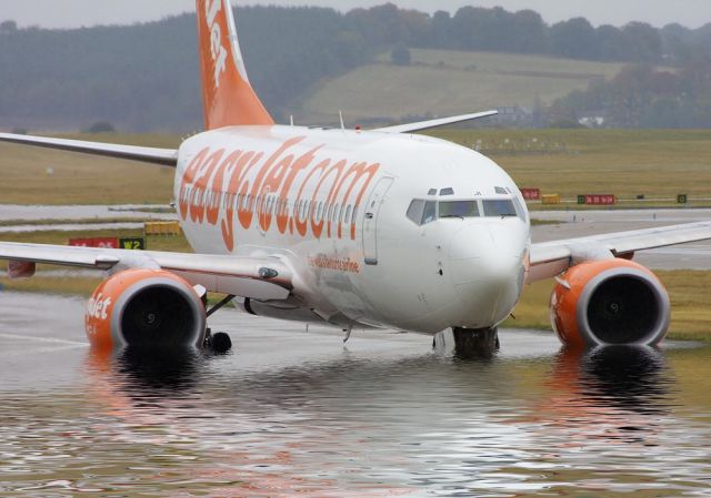 Boeing 737-700 — - A plane from EasyJet trying to get through the high tide of water at the airport. LOL!