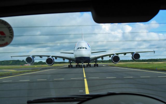 Airbus A380-800 (G-XLEA) - a view through the rear windscreen of the airport police follow me vehicle 30/7/13.