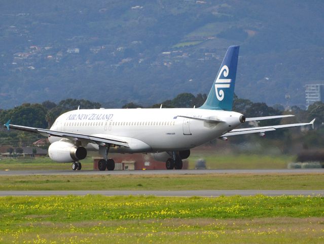 Airbus A320 (ZK-OJI) - Rolling for take off on runway 05, for flight home to Auckland, New Zealand. Thursday 12th July 2012.